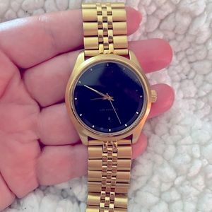 Movement watch- bracelet close, stainless steel, water resistant.